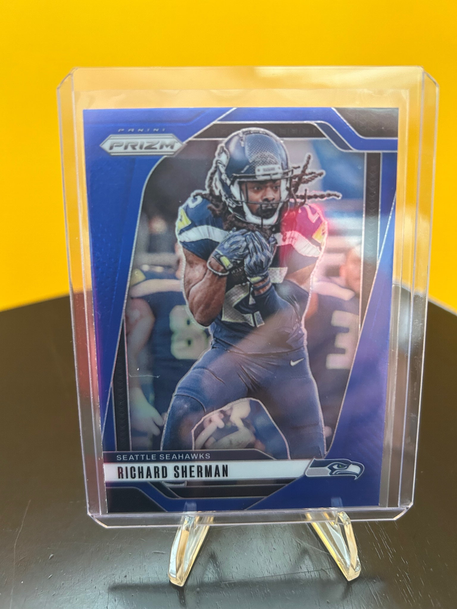 2024 Panini Prizm #265 Richard Sherman Blue Sparkle #/96