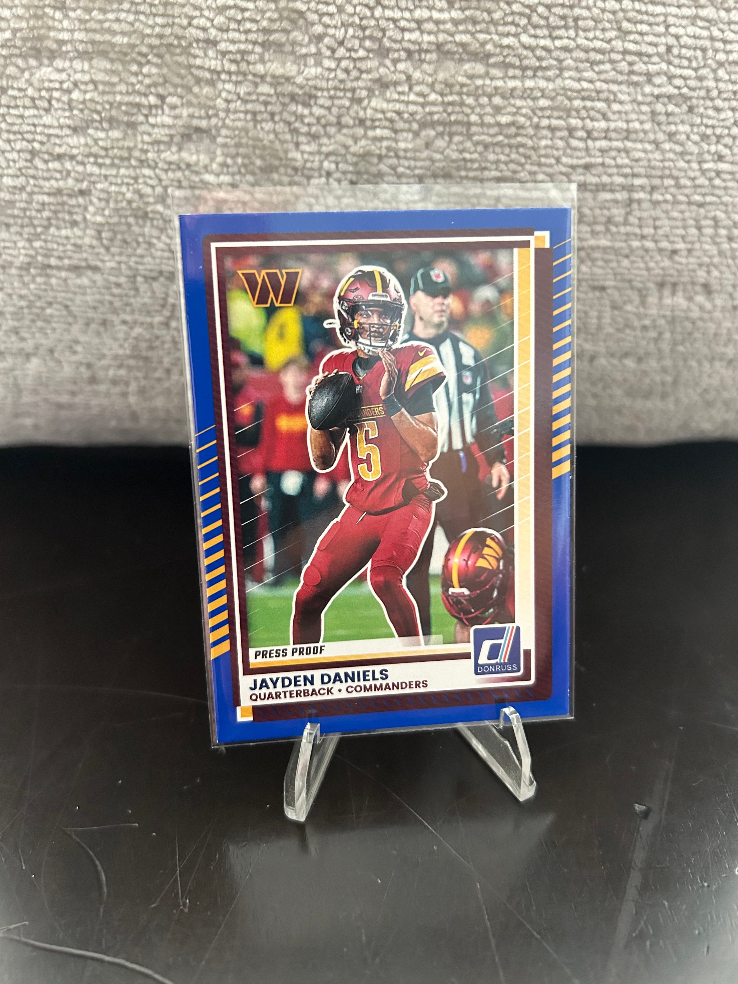 2025 Donruss #28 Jayden Daniels Press Proofs Blue