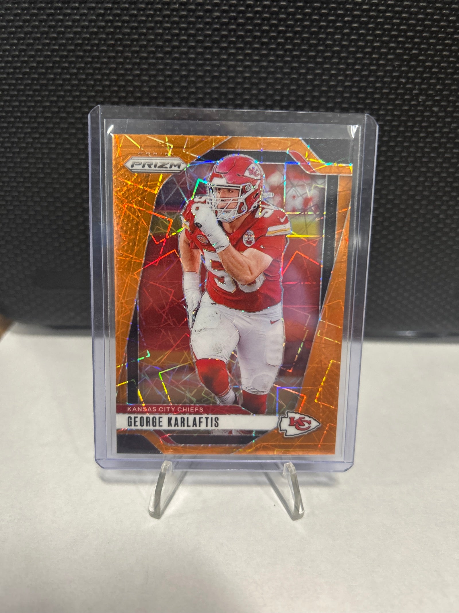 2024 Panini Prizm- Geaorge Karlaftis Orange Lazer Prizm #142 Chiefs