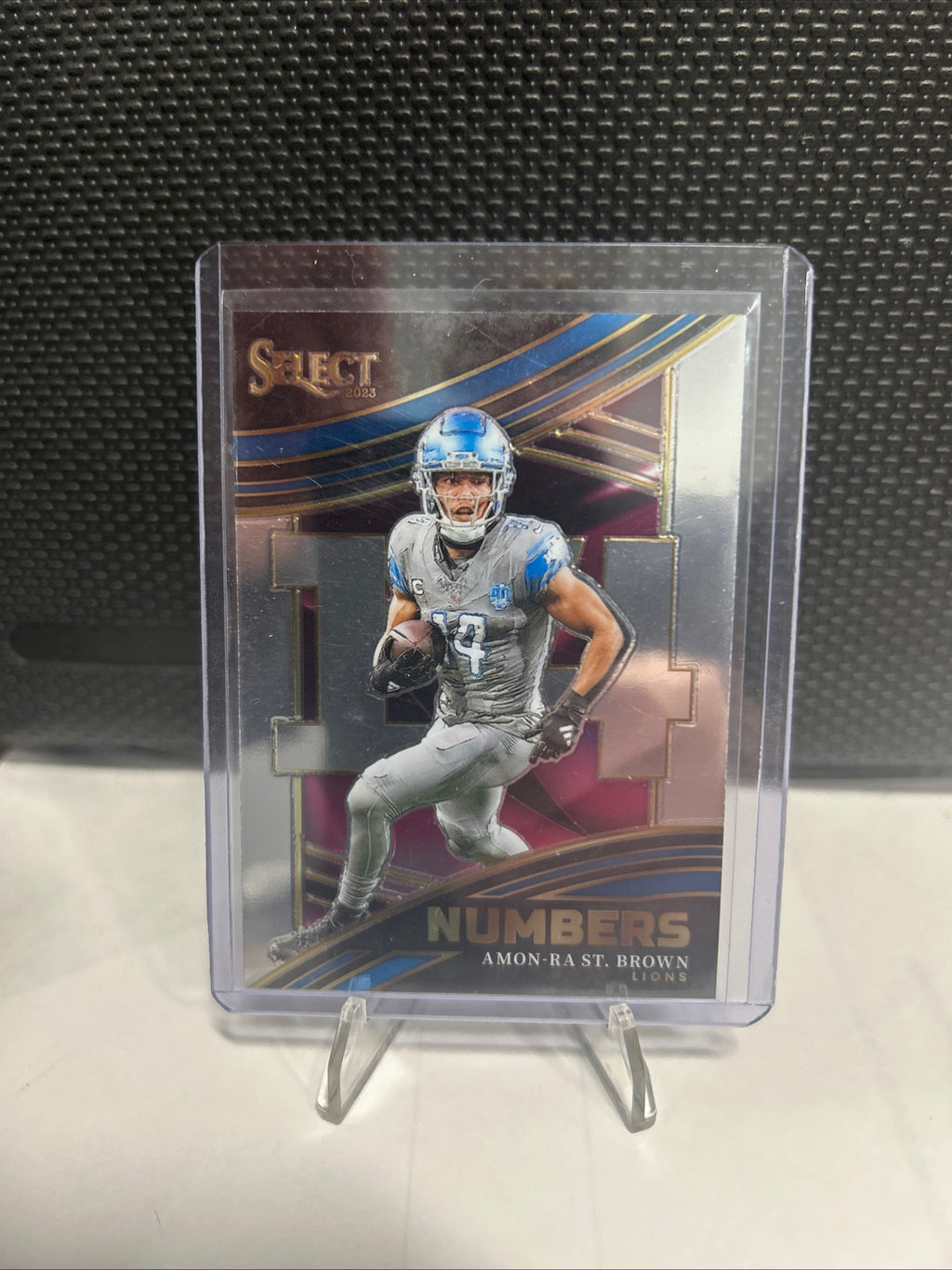 2023 Panini Select - Select Numbers Amon-Ra St. Brown #NMB-AST